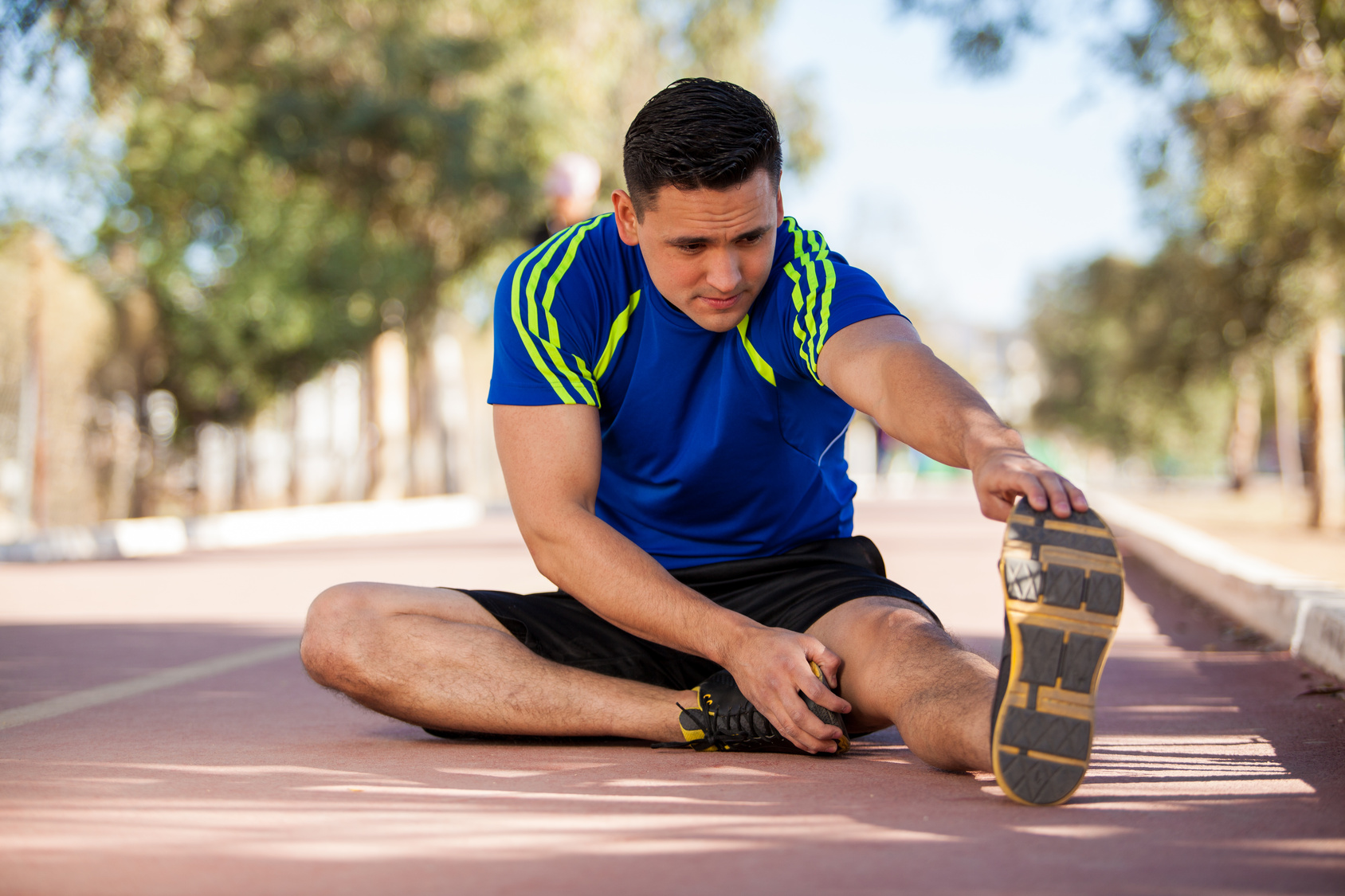 Young athlete stretching